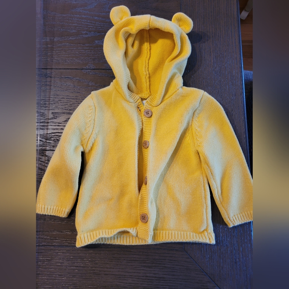Vibrant Yellow Vest with Hood and Snap Closure
